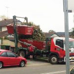 Driver Mick collecting a 4mtr builders waste bin in Glenmore Park